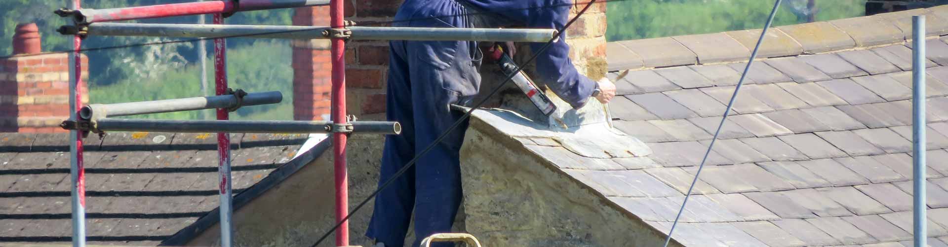 commercial-and-residential-window-cleaning-gutter-cleaning-roof-cleaning-pressure-washing-patio-man-repairing-roof-damage